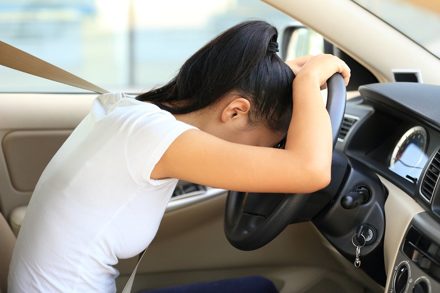 bigstock-sad-woman-driver-in-car-914812672952967788510791192.jpg